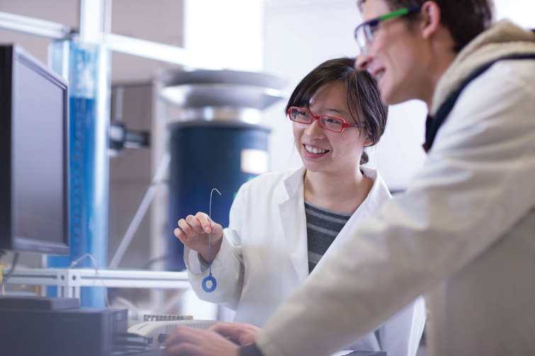 Chemical engineering students conducting an experiment